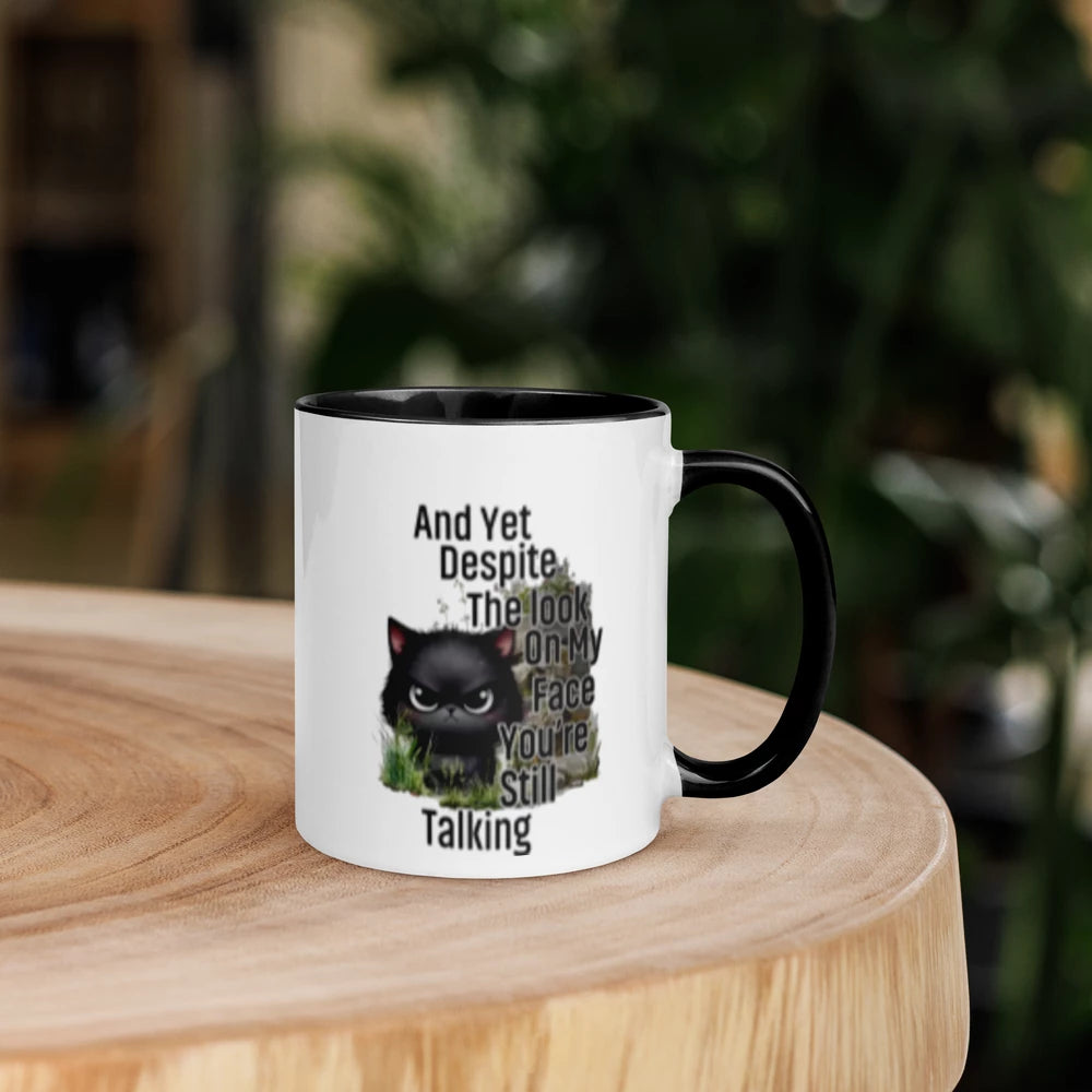 CAT "And Yet Despite the Look on My Face, You're Still Talking" Funny White Ceramic Mug with Color Inside