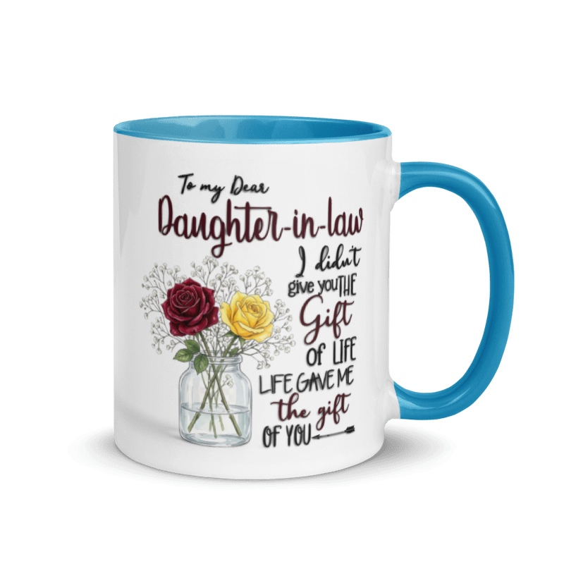 A white ceramic mug with a bright blue interior and handle, printed with a sentimental message for a daughter-in-law and an illustration of a red rose and a yellow rose in a glass vase.