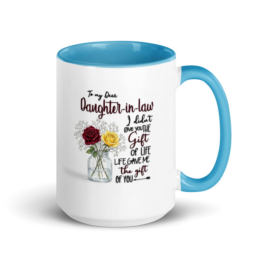 A white ceramic mug with a bright blue interior, handle, and rim, featuring a printed message for a daughter-in-law and an illustration of red and yellow roses in a vase.