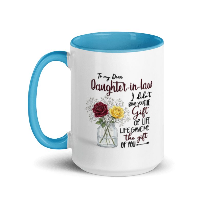 A white ceramic mug with a bright blue handle and interior, featuring a printed message to a daughter-in-law and an illustration of red and yellow roses in a glass vase.