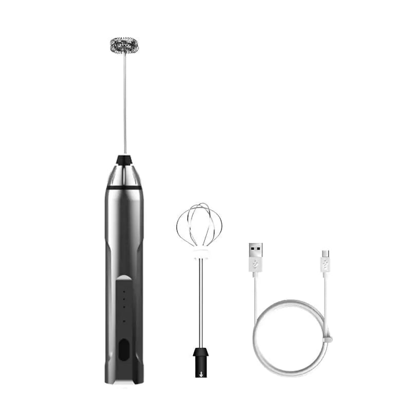 Black and silver handheld frother with attachments on a white background