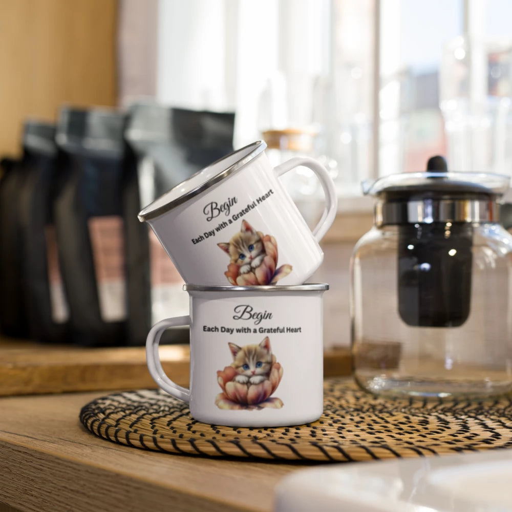 Two enamel mugs on a kitchen counter.