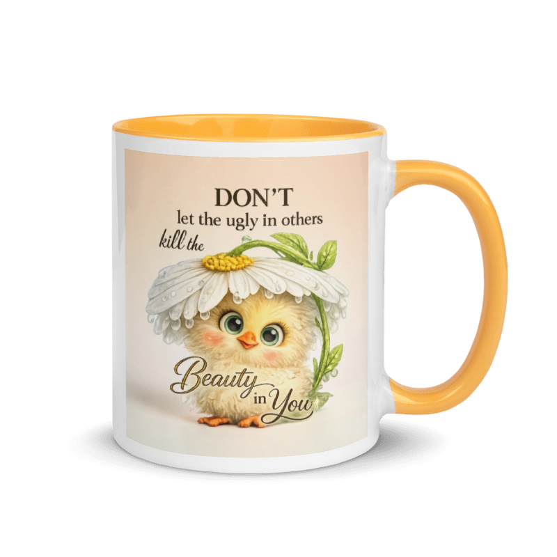 A white ceramic mug with a yellow-orange handle and interior, featuring a printed design of a cute yellow chick under a daisy with the text 'DON'T let the ugly in others kill the Beauty in You'.
