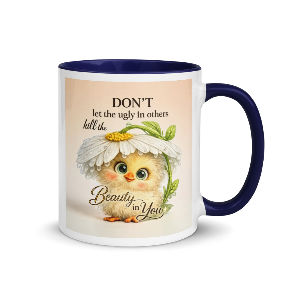 A white ceramic mug with a dark navy blue interior, handle, and rim, featuring a printed graphic of a cute yellow chick under a daisy with the text 'DON'T let the ugly in others kill the Beauty in You'.