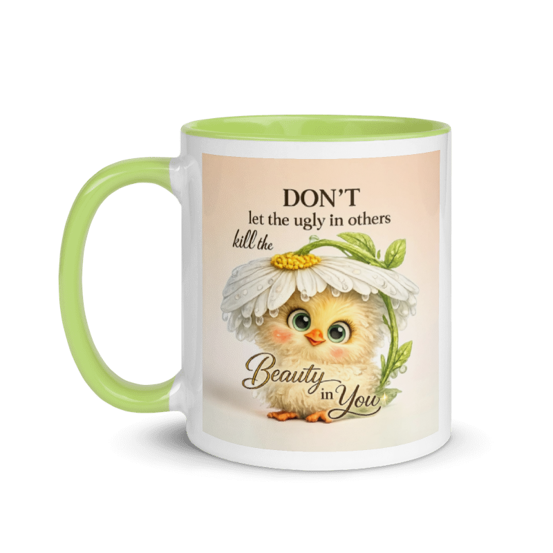 A white ceramic mug with a light green handle and interior, featuring a printed design of a cute yellow chick under a daisy flower with the text 'DON'T let the ugly in others kill the Beauty in You'.