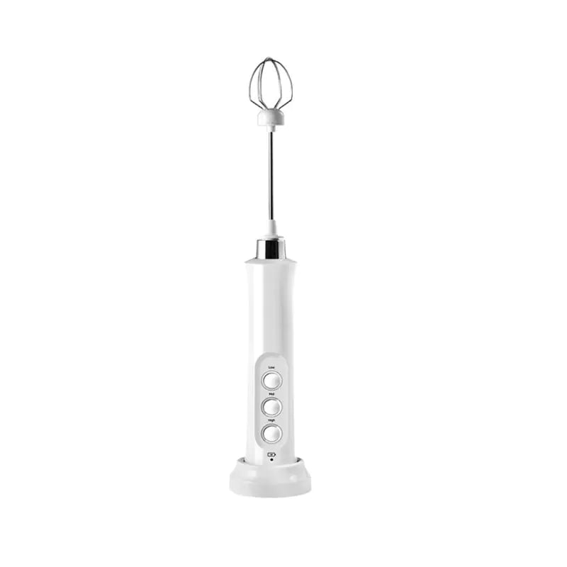White handheld mixer with whisk attachment on a white background