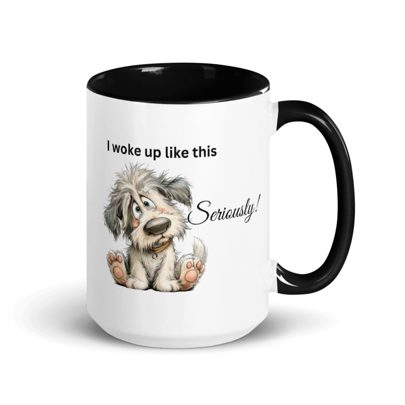 A white ceramic mug with a black interior and black handle, featuring a cartoon dog illustration and the text 'I woke up like this Seriously!' printed on the side.