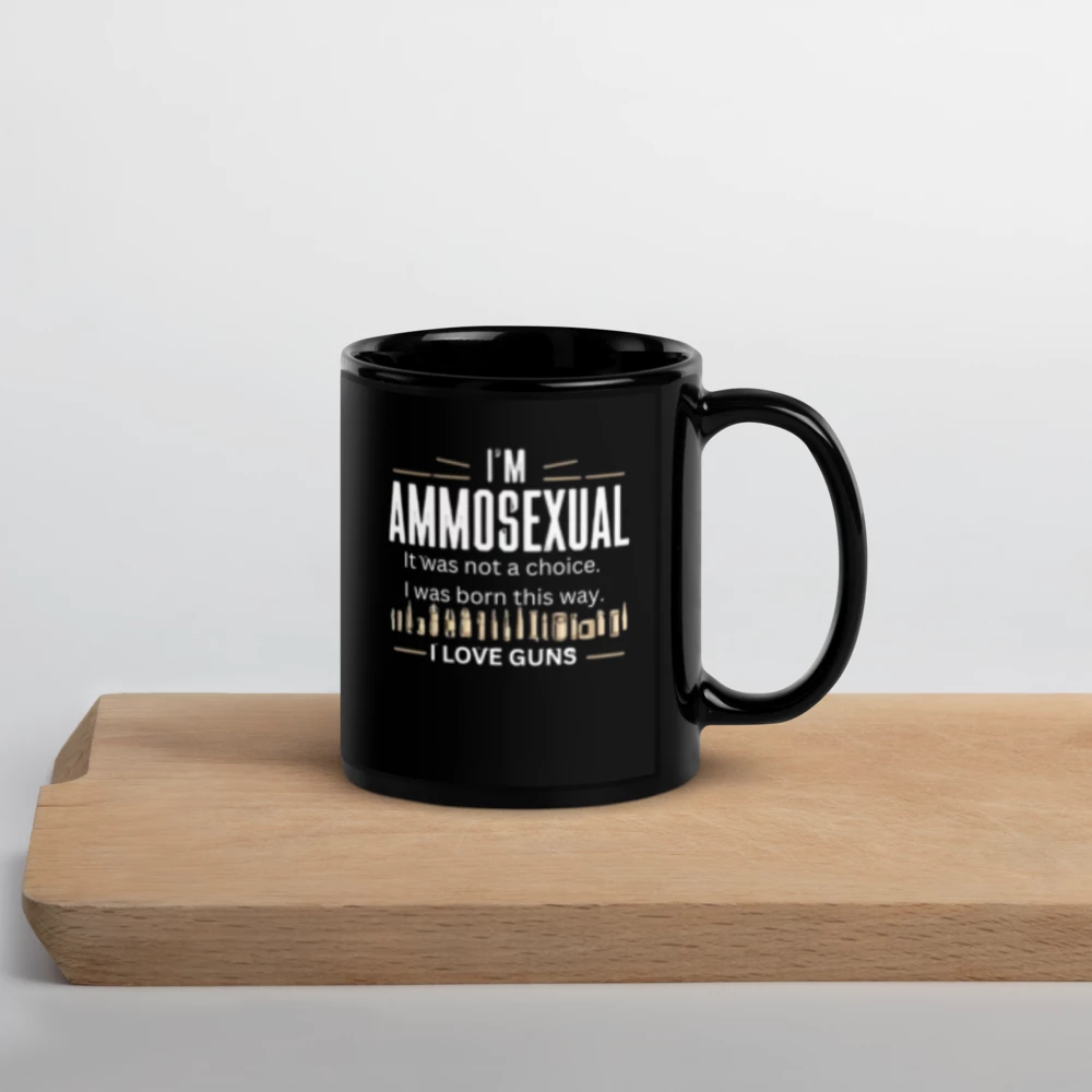 Black mug with text on a wooden surface and light gray background