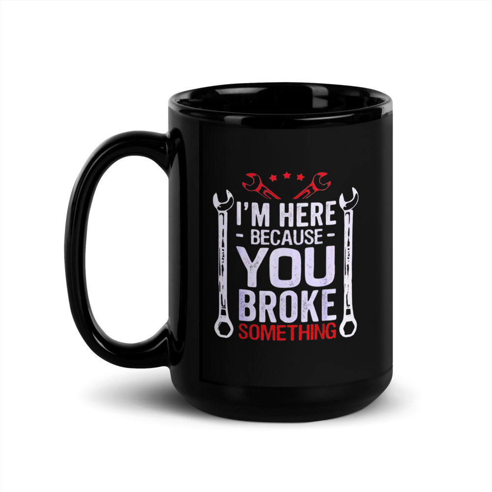 Black mug with humorous text and wrench graphics 