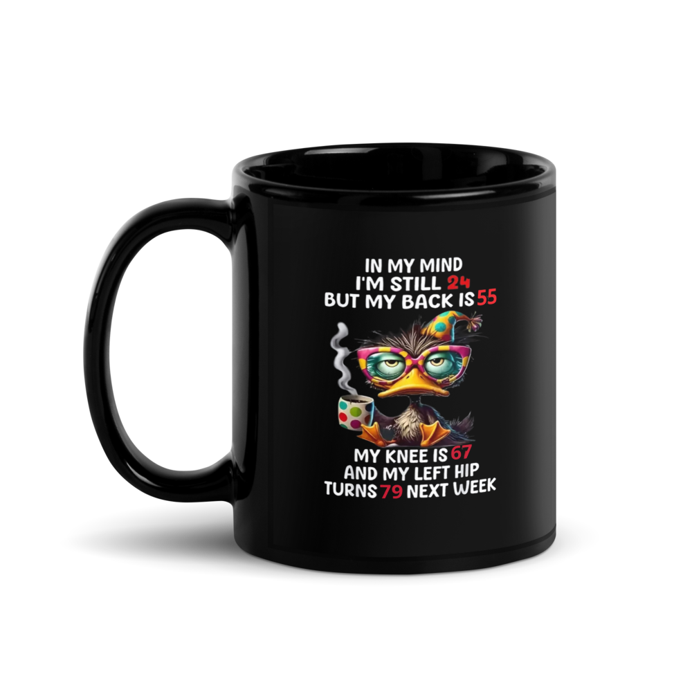 Black mug with a colorful owl design and humorous text 