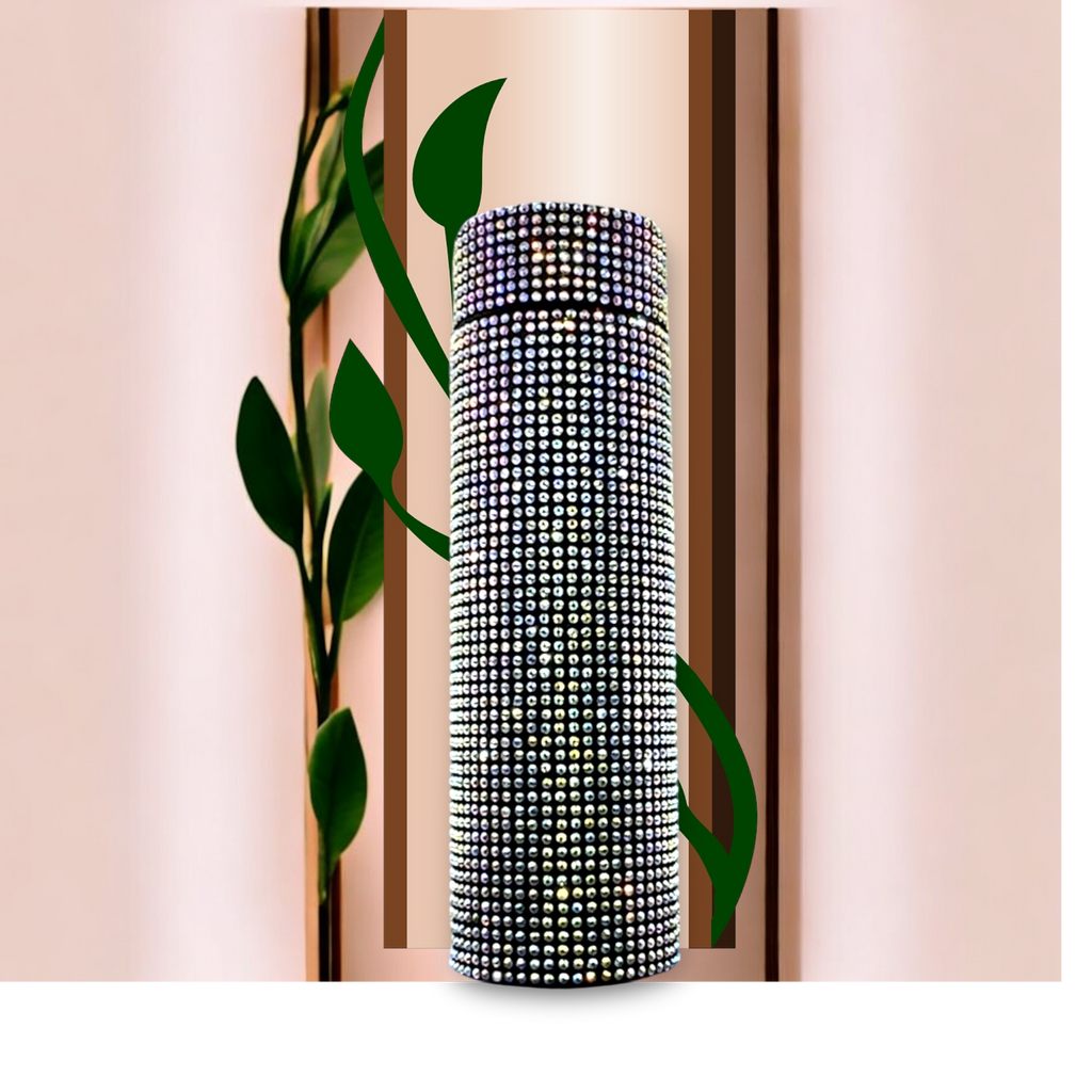 Decorative cylindrical vase with silver  rhinestone embellishments on A neutral background