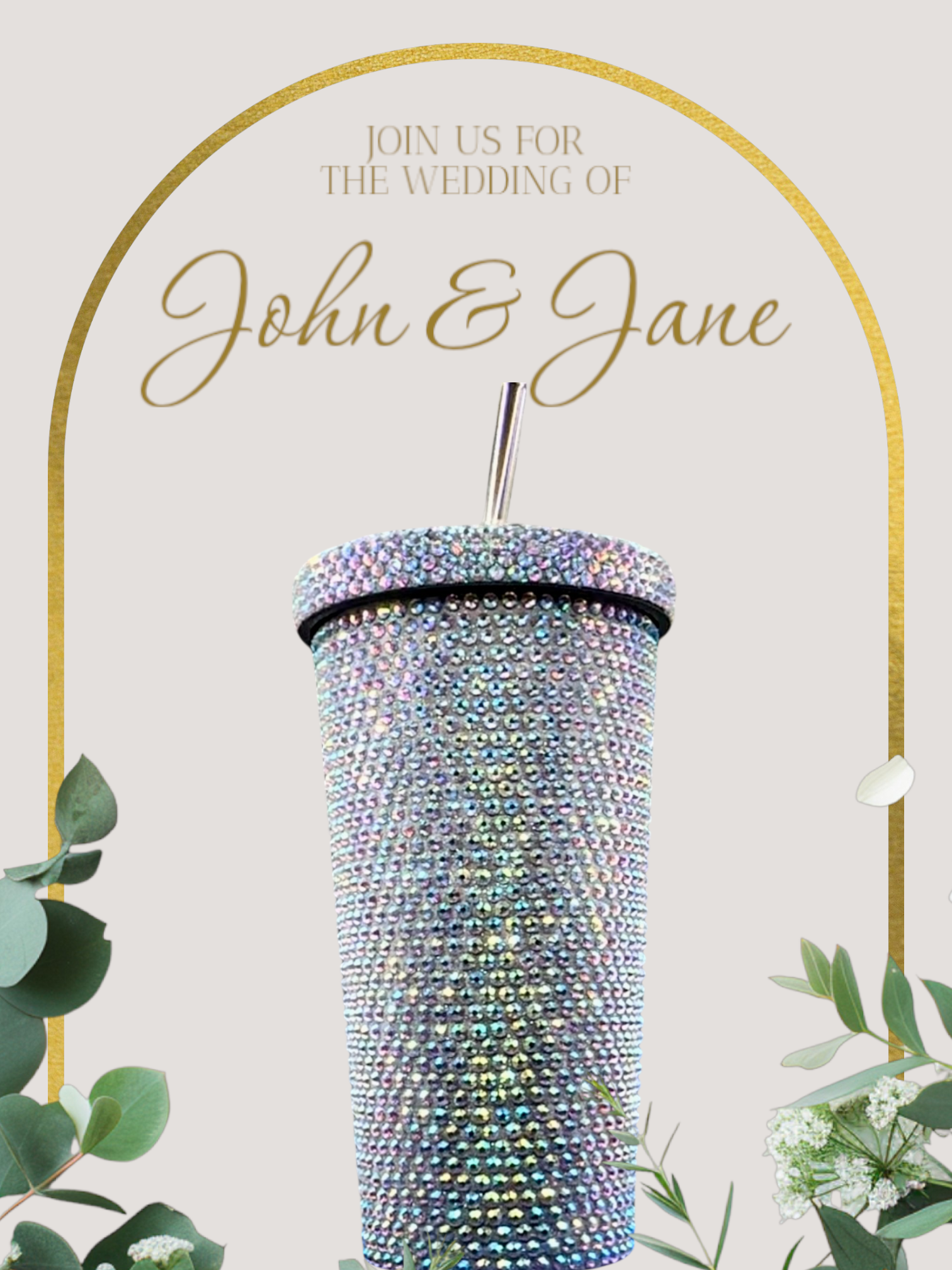 Decorative tumbler with rhinestone embellishments for a wedding invitation, featuring a gold arch and greenery.