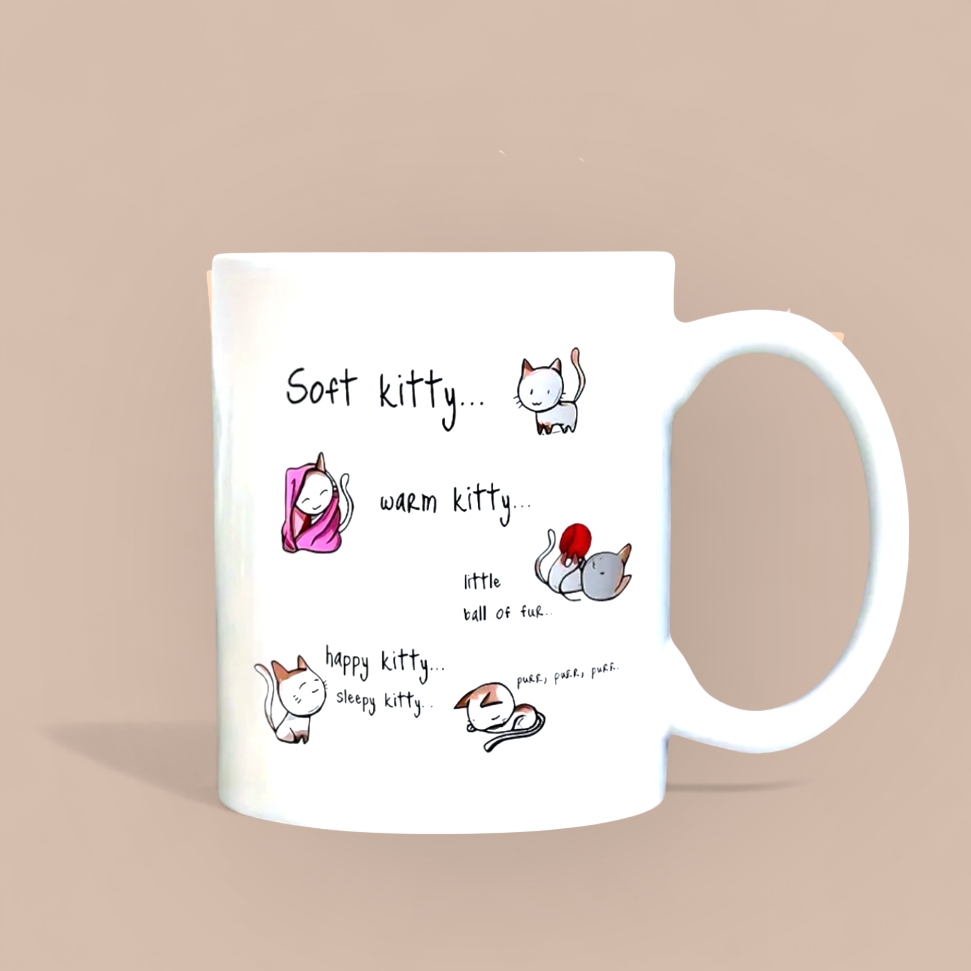 White mug with cat-themed text and illustrations on a beige background