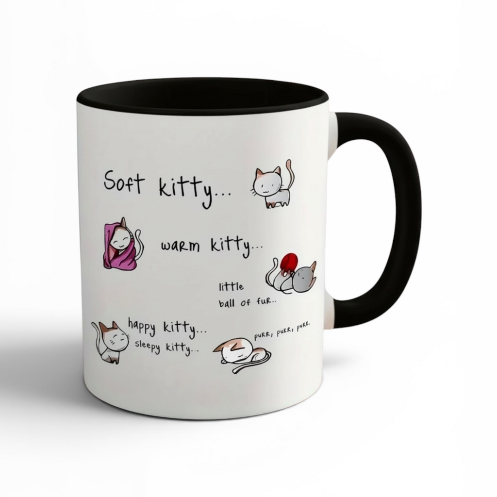 LT. Handed 11OZ.Mug with cartoon cat illustrations and text on a white background : "Soft kitty… “