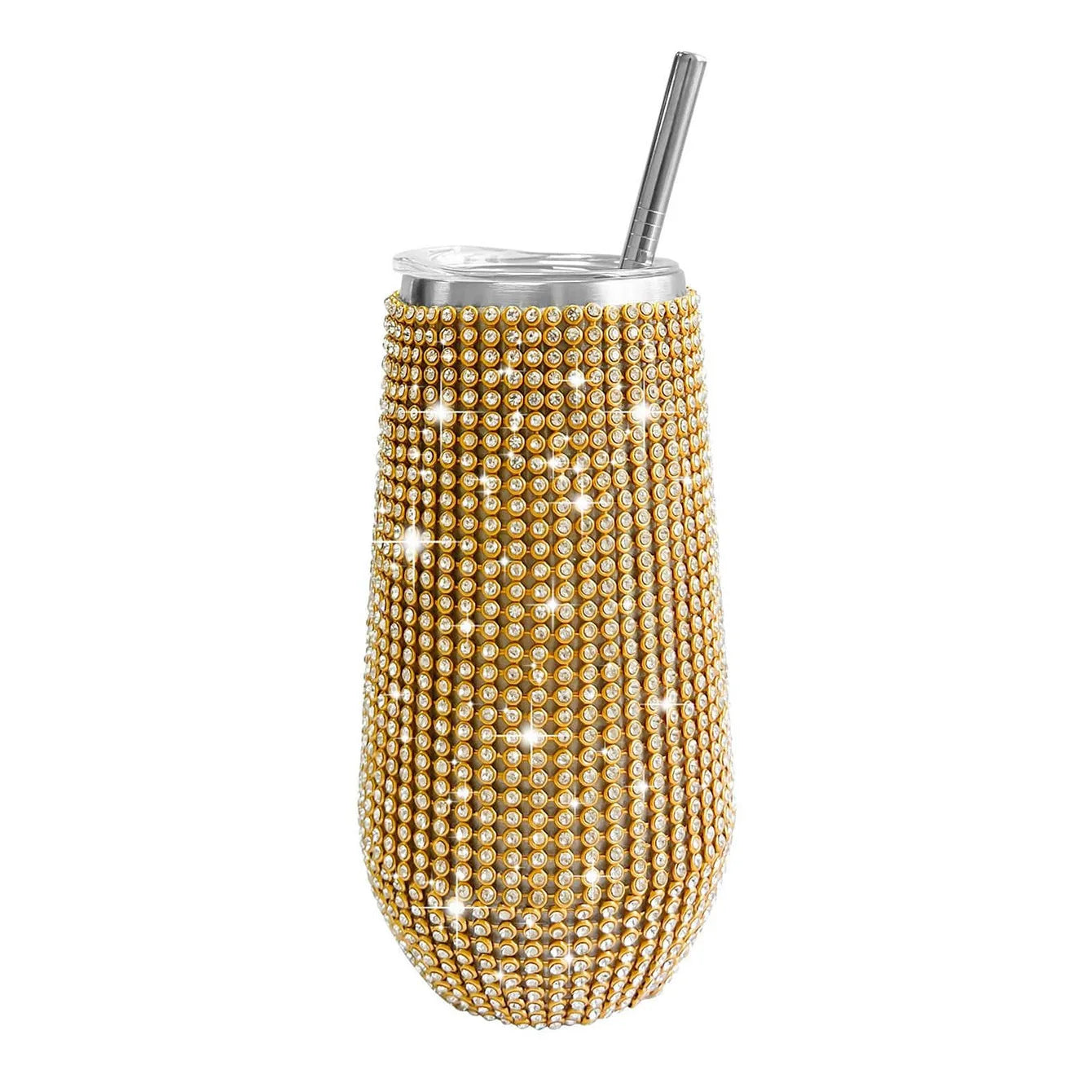 Gold beaded tumbler with a straw on a white background