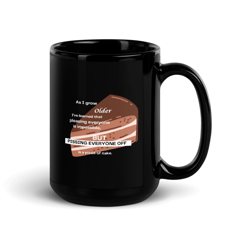 Black mug with a humorous design of a cake slice and text