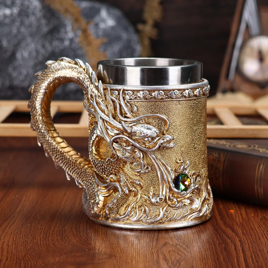 Decorative mug with dragon handle on a wooden surface