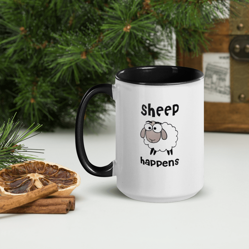 White mug with black handle and text, featuring a cartoon coffee cup, on a surface with greenery and cinnamon sticks.