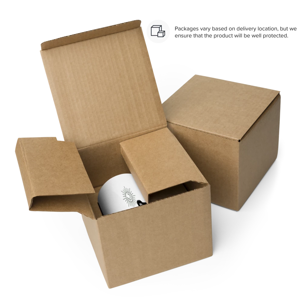 Open cardboard box with a silver product inside on a white background
