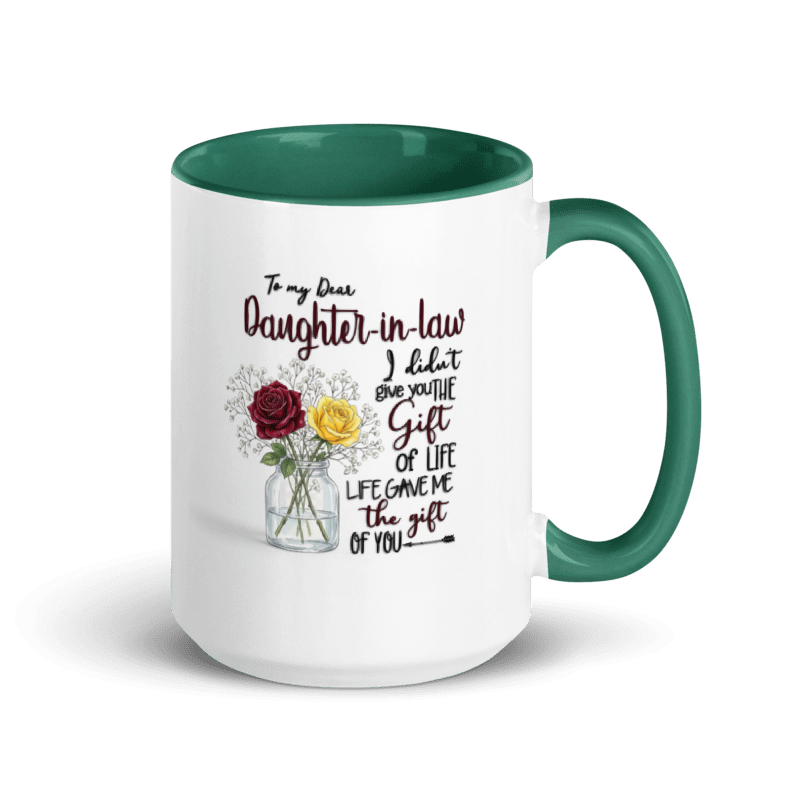 A white ceramic mug with a dark green interior, handle, and printed message reading 'To my Dear Daughter-in-law' along with an illustration of red and yellow roses in a vase.