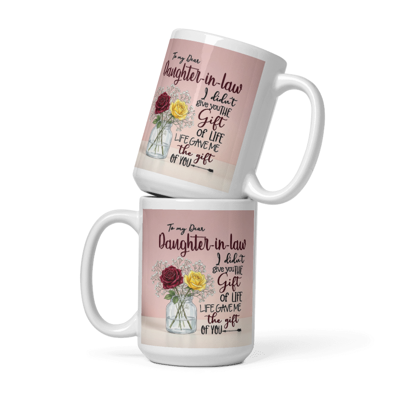 Two stacked white ceramic mugs with a pink printed design featuring a floral illustration and a sentimental message addressed to a daughter-in-law, shown on a clean white background.