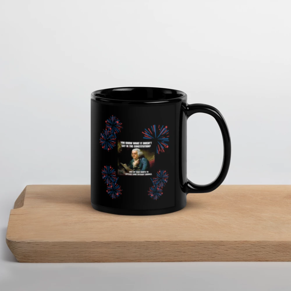 Lft. Handed 11oz Black mug with a design featuring a person and fireworks on a wooden surface 