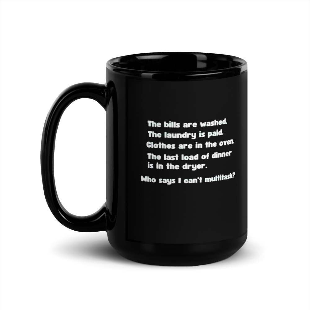 Black mug with white text 